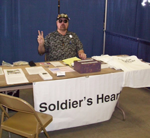 volunteer staffing a table